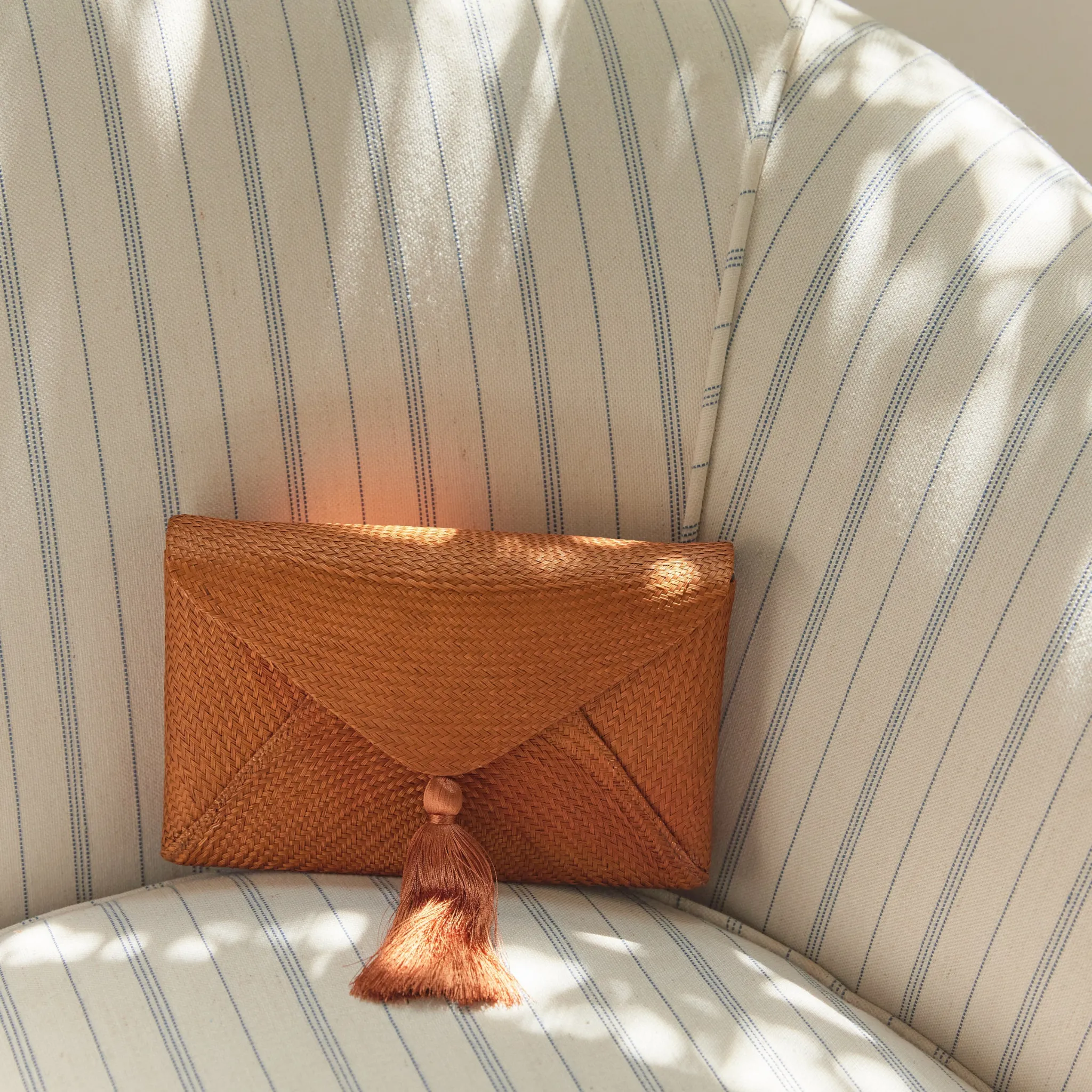 Cassia Straw Clutch Bag in Brown