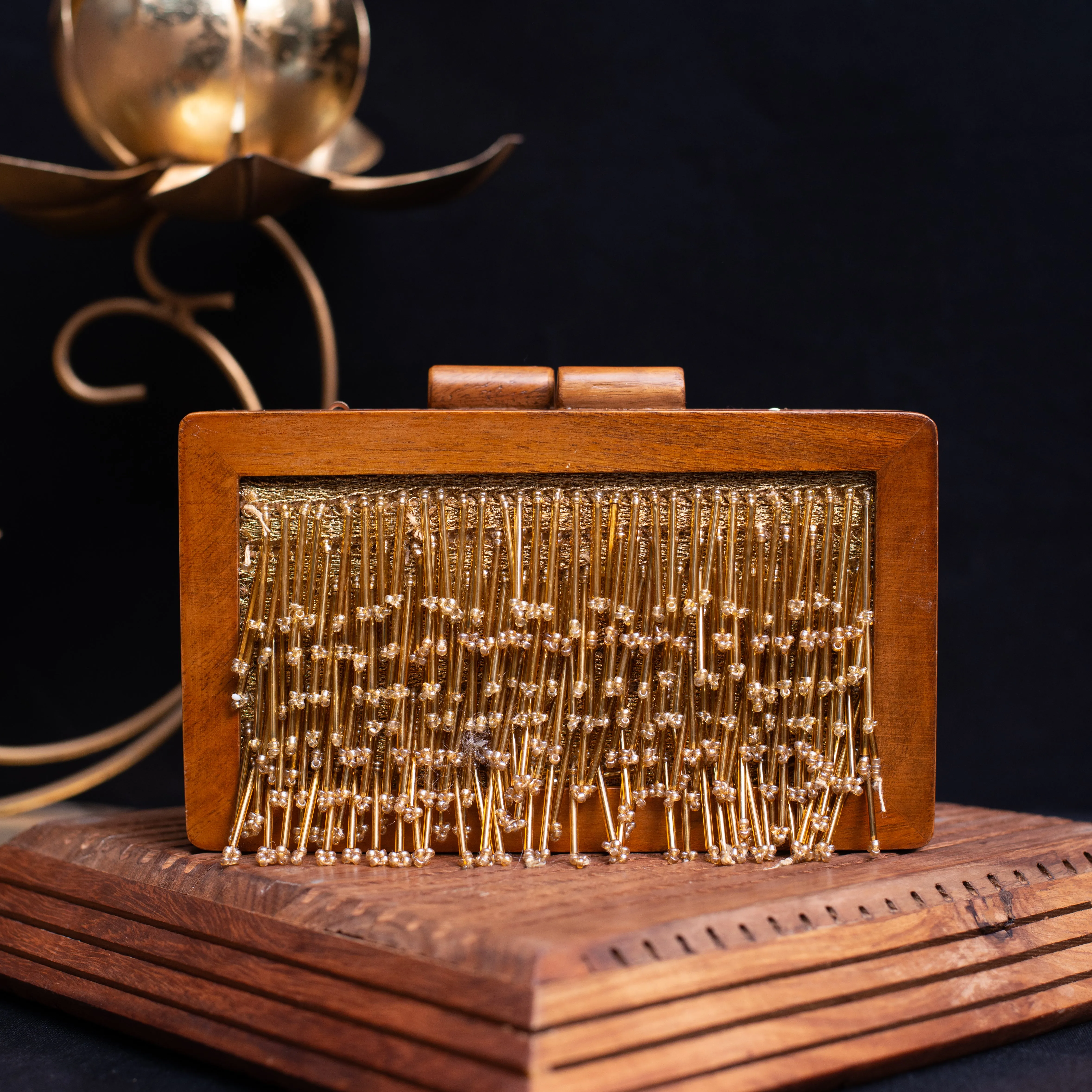 Golden Tassel Embellished Wooden Clutch