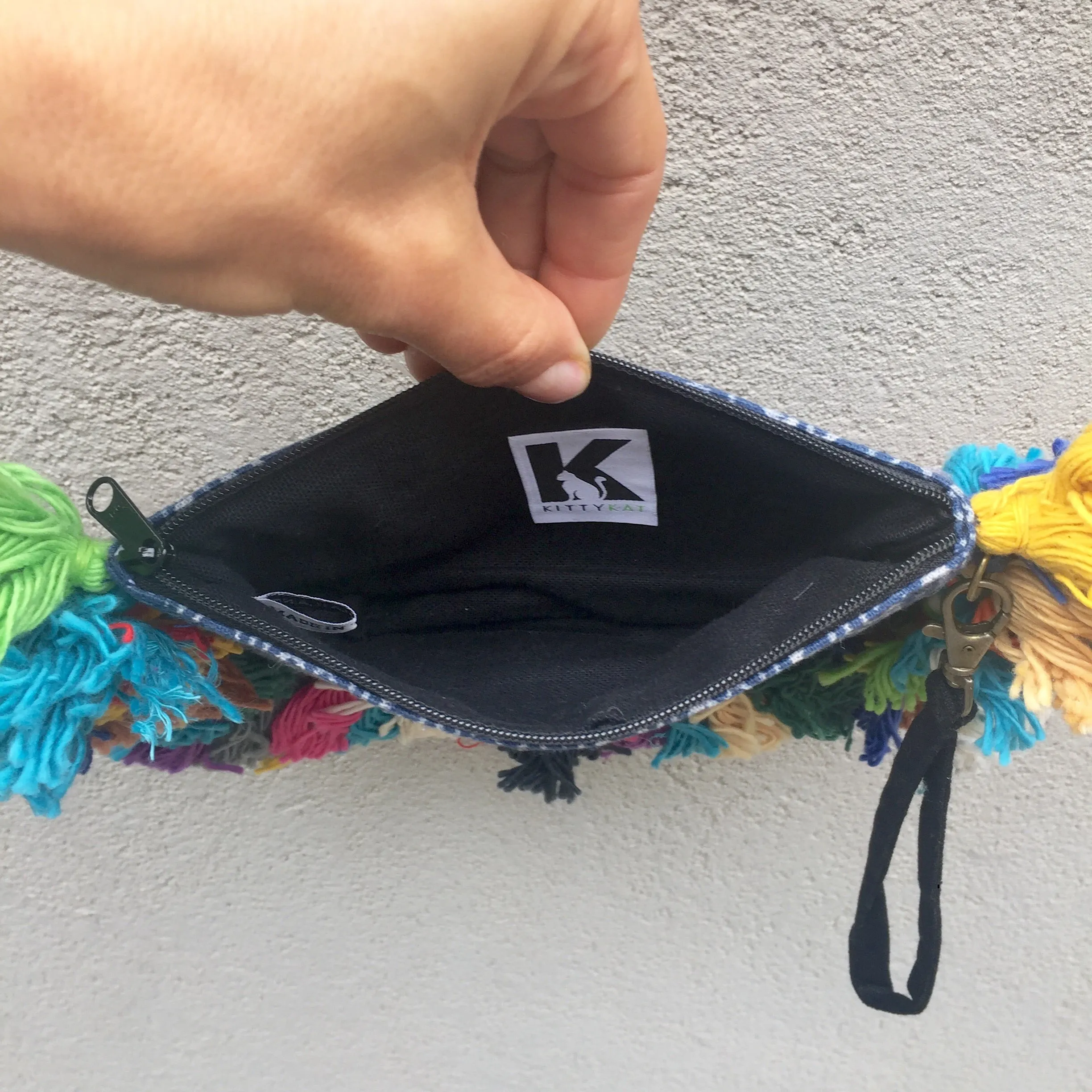 Sia Batik Bohemian Pom Pom Tassel Clutch
